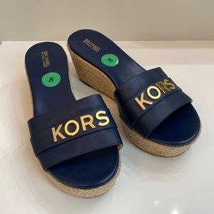 Michael Kors Navy leather and jute wedge sandals, size 8.
